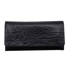 Elegant leather clutch with detachable wrist strap